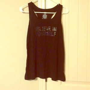 Athletic tank top with "Believe in yourself" print
